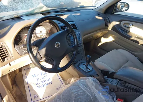 2002 Nissan Maxima Se z USA, uszkodzony, nr VIN JN1DA31D02T404731